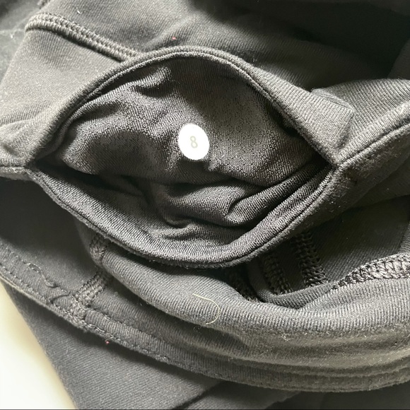 Lululemon Black Capris with tie detail. Size 8 - Picture 5 of 5